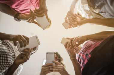 anonymous-people-busy-with-smartphones
